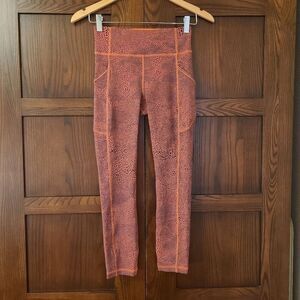 Lululemon Invigorate High-Rise Crop 23" in Crackle Glaze Vintage Orange Larkspur